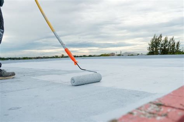 At what temperature can you apply elastomeric roof coating?